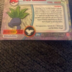 Pokemon Card with Green and Purple Design